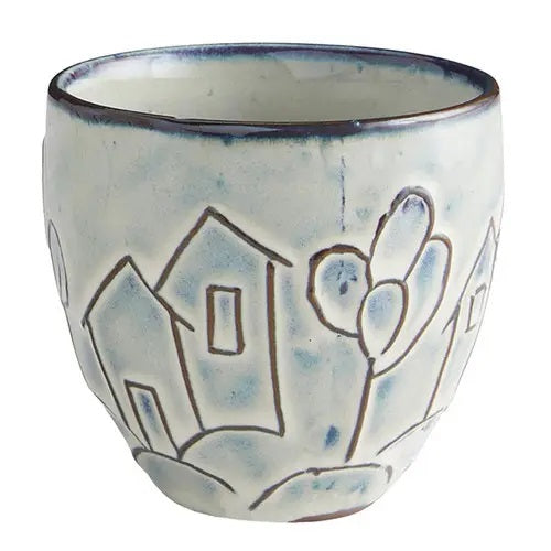 Small ceramic flower pot with carved house design, available at Cerulean Arts.