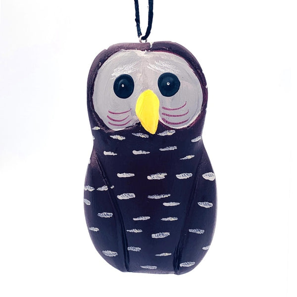 Balsa wood barred owl ornament hand-carved and painted with non-toxic acrylic paints by a cooperative of artisans on Isla Solentiname, Nicaragua, available at Cerulean Arts.