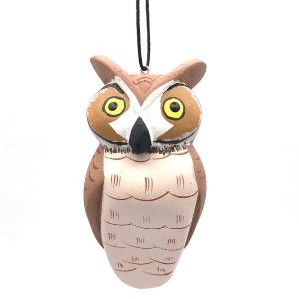 Balsa wood great horned owl ornament hand-carved and painted with non-toxic acrylic paints by a cooperative of artisans on Isla Solentiname, Nicaragua, available at Cerulean Arts. 