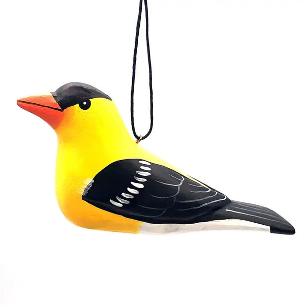 Balsa wood goldfinch ornament hand-carved and painted with non-toxic acrylic paints by a cooperative of artisans on Isla Solentiname, Nicaragua, available at Cerulean Arts.  