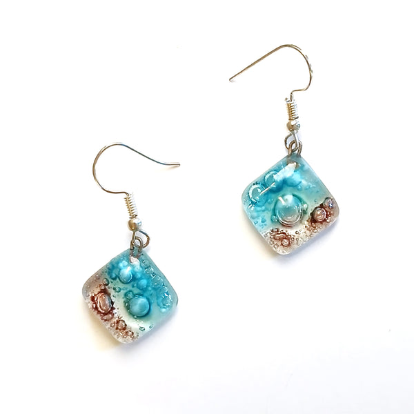 Fused glass diamond shaped earrings in a mix of colors available at Cerulean Arts.