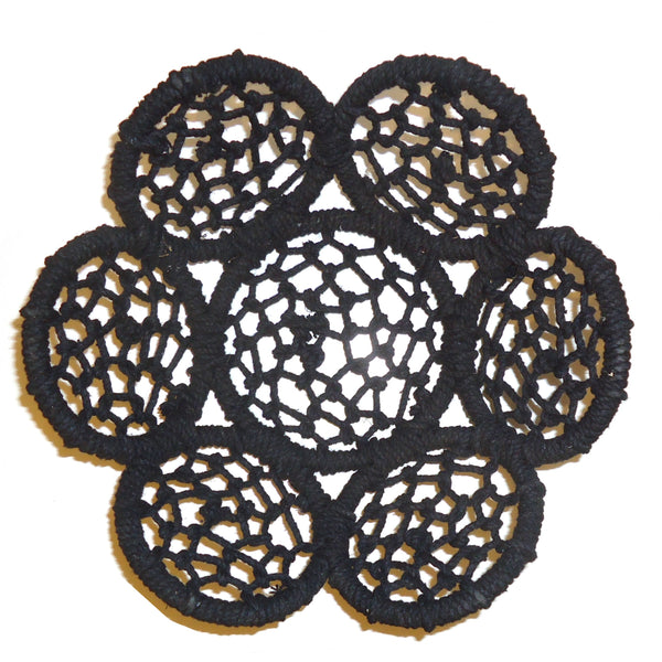 Small woven jute basket with black flower pattern available at Cerulean Arts.  
