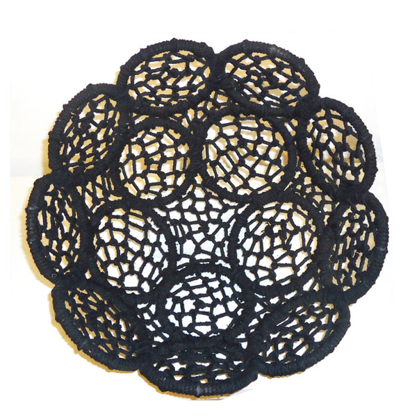 Medium woven jute basket with black flower pattern available at Cerulean Arts.  