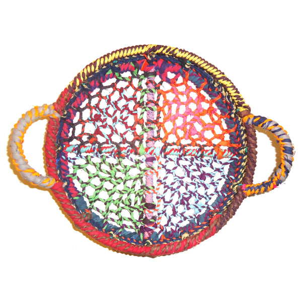 Small round tray featuring 3 1/2" deep sides woven in multi-colored jute with handles available at Cerulean Arts. 