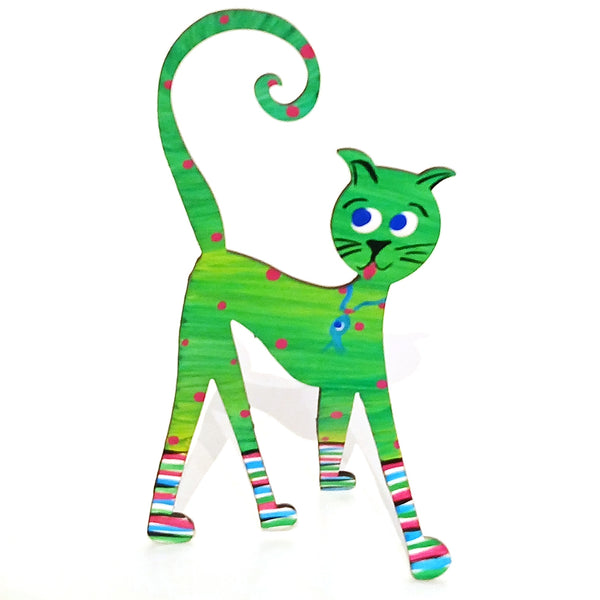 A colorful steel cat figurine / photo holder standing on a white background. The cat is primarily green with pink polka dots and multicolored striped details on its legs and tail.