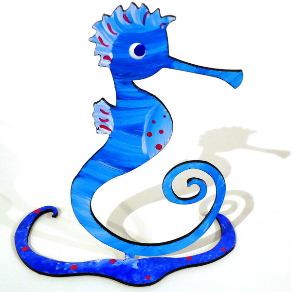 Hand painted steel sculpture of a floating seahorse available at Cerulean Arts. 