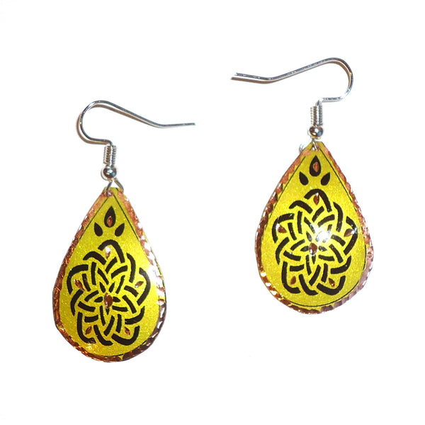Etched copper floral earrings with chartreuse teardrop design available at Cerulean Arts.