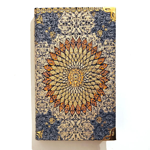 Decorative notebook with a blue and orange geometric design