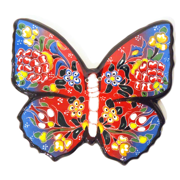 Butterfly-shaped ceramic trivet / hot pad with colorful glazed pattern, available at Cerulean Arts.