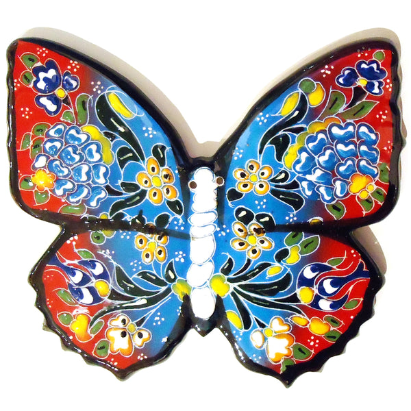 Butterfly-shaped ceramic trivet / hot pad with colorful glazed pattern, available at Cerulean Arts.