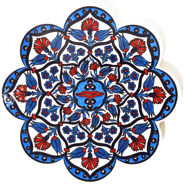 Scallop edged ceramic trivet / hot pad with colorful glazed pattern in blue, available at Cerulean Arts.