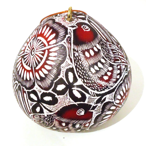 Finely carved gourd ornament with primavera birds design in red, available at Cerulean Arts.