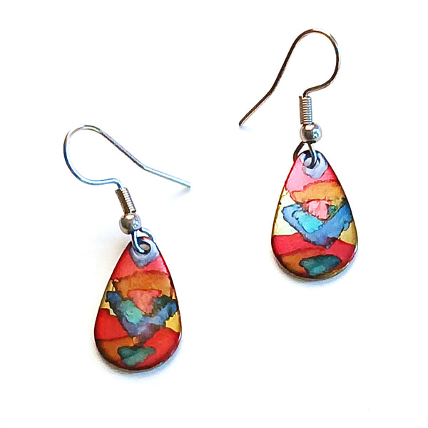 Stainless steel teardrop earrings hand painted with alcohol ink in red shades, available at Cerulean Arts.