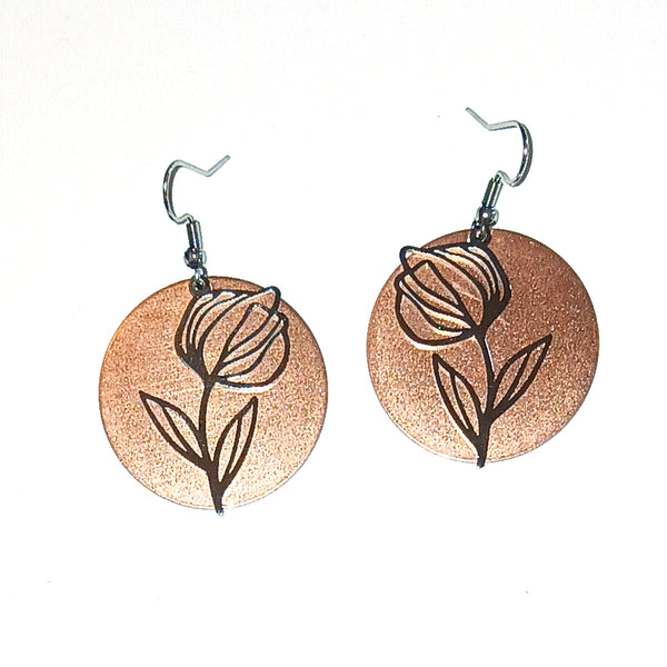 Copperearrings with floral design 