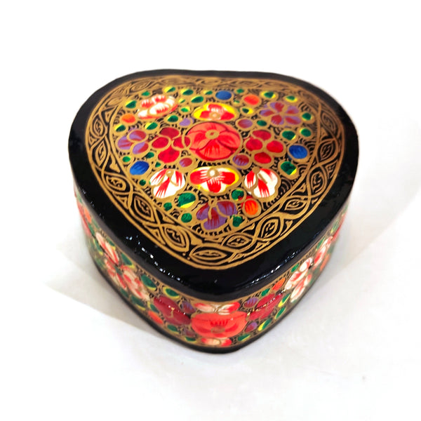 Decorative heart-shaped box with floral patterns