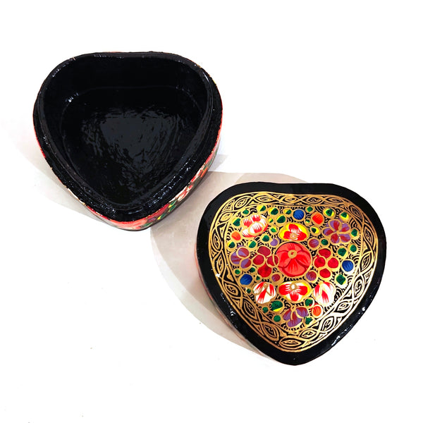 Decorative heart-shaped box with floral patterns