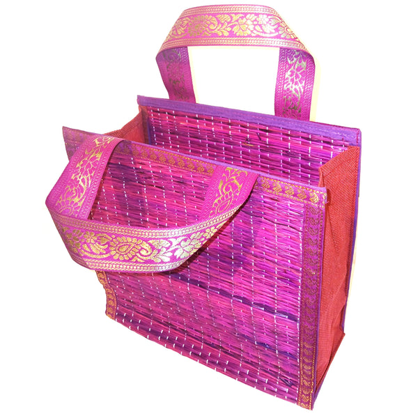 Fuchsia woven bag with decorative handles