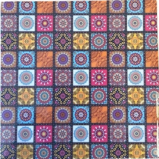 Colorful patterned coaster with a checkered design featuring various shapes and colors.