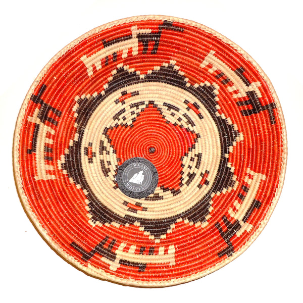Decorative basket with natural, orange and brown dogs and star pattern.