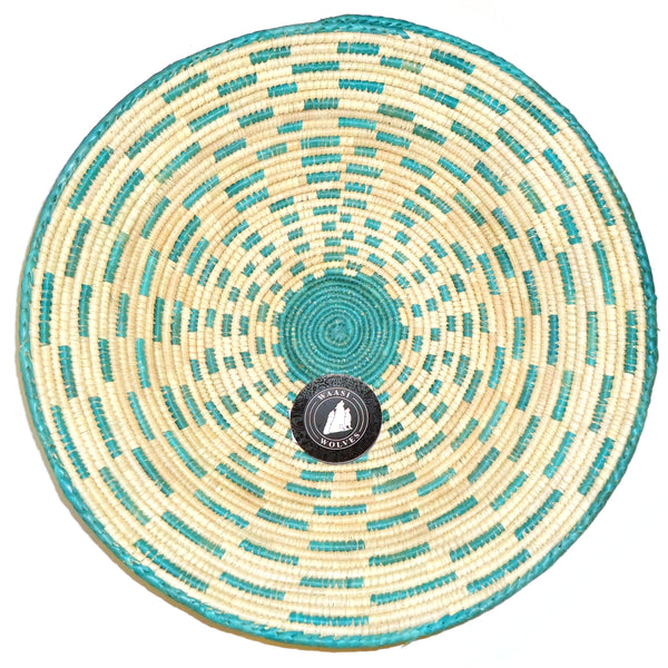 Round woven bowl with turquoise and beige pattern
