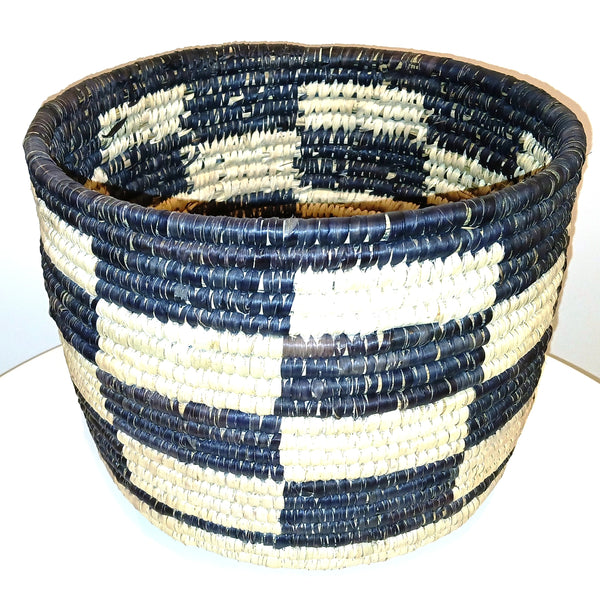 Woven basket with brown and white pattern 