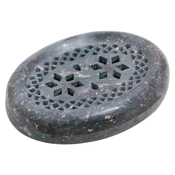 A dark gray stone soap dish with a perforated, starburst-like pattern on top, shown on a plain white background.