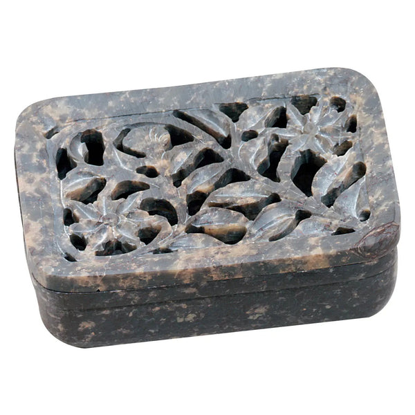 Carved soapstone soap dish with floral carving.
