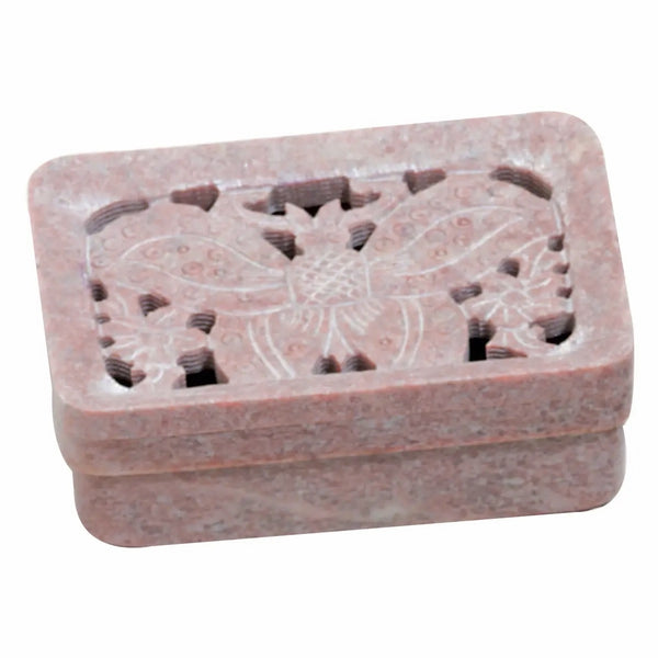 A small rectangular pink soapstone soap dish with a carved butterfly design on the lid, shown on a plain white background.