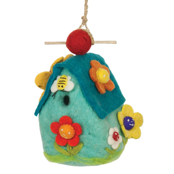Colorful felt birdhouse with flowers and a bee.