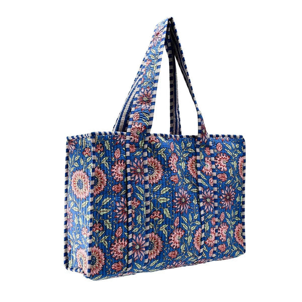 Floral patterned tote bag with blue background
