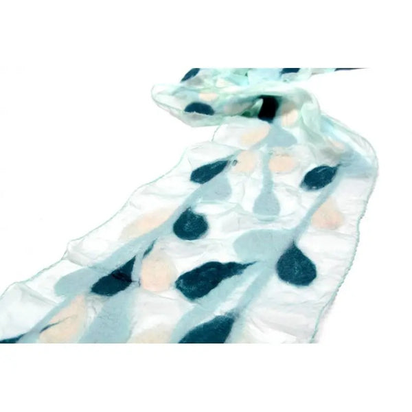 A sheer white chiffon scarf with a pattern of felted blue-gray and off-white leaves.