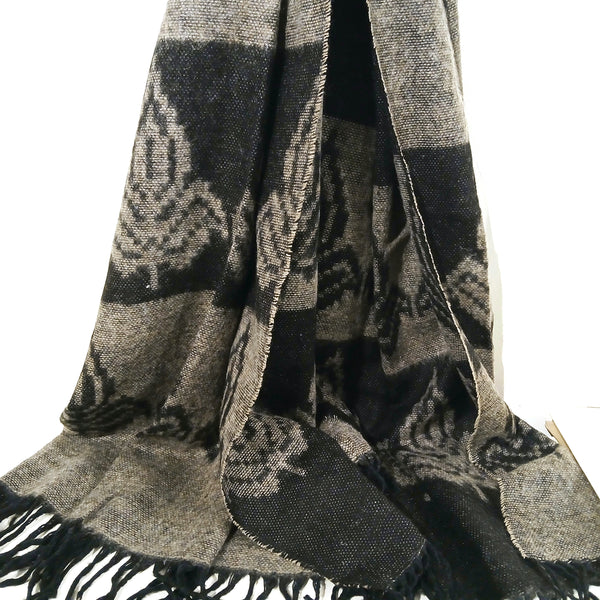 Gray and black patterned scarf with fringes