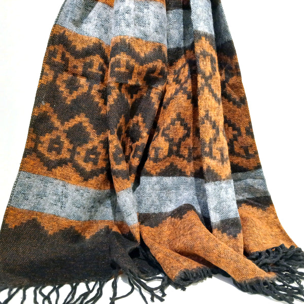 Patterned scarf with orange, black, and gray colors