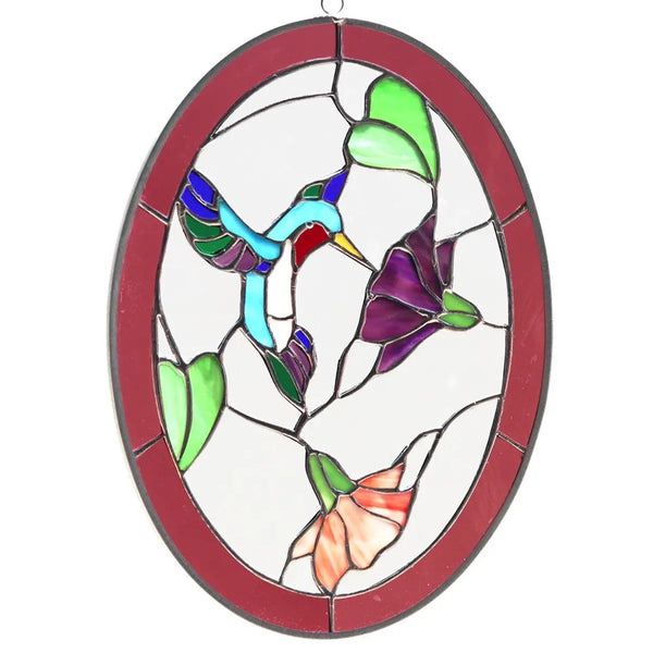 Stained glass panel with a hummingbird and flower design.