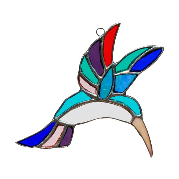 Stained glass hummingbird in blues and purples.