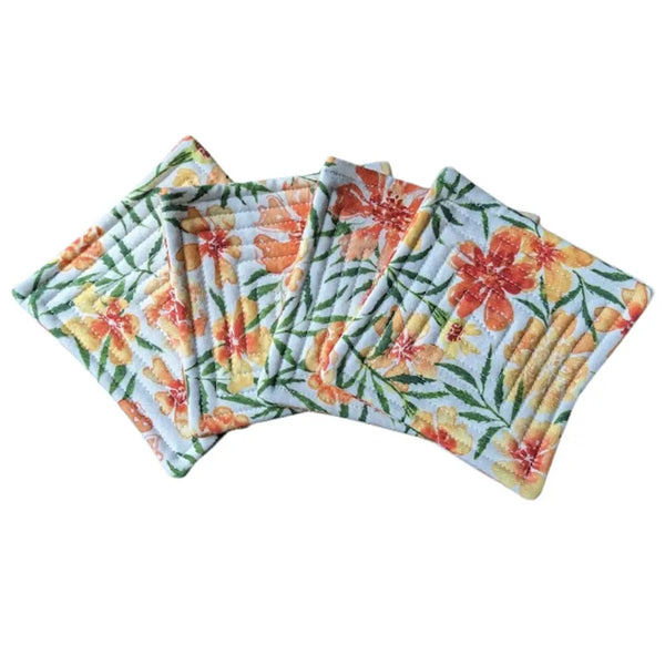 Quilted fabric coaster set with orange marigold pattern.