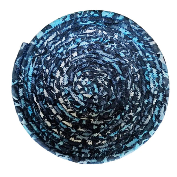 Fabric bowl with deep blue colors.