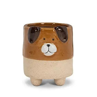 Ceramic planter with glazed dog design on top and with four legs on bottom.