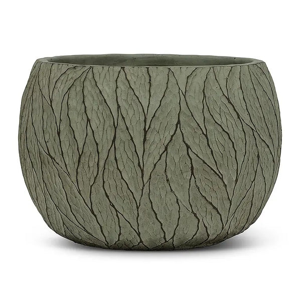 Round cement planter with sculpted leaf pattern in sage green.