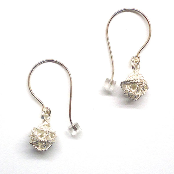 Sterling silver French hoops with textured silver plated (silver over copper) orbs, available at Cerulean Arts. 
