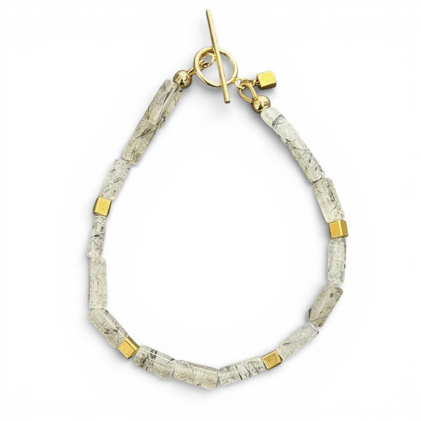 Bracelet with grey beads and gold accents