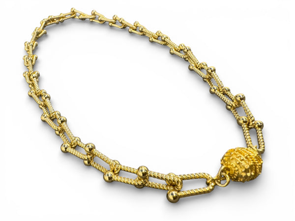 Gold necklace with intricate design