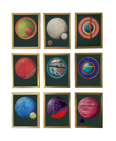 A 3x3 grid of nine framed abstract space-themed paintings featuring planets, moons, and circular cosmic designs on dark green backgrounds with gold frames, shown against a white background.