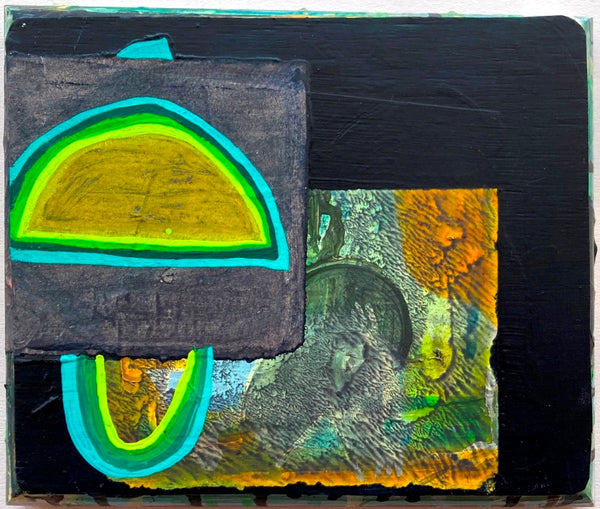 Abstract art piece with geometric shapes on a textured surface