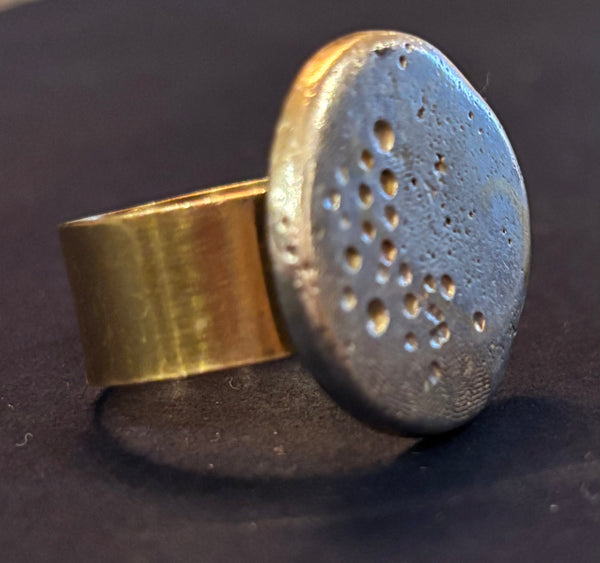 Ring made of sterling silver and 18 kt gold by artist Jessica Berwind. Included in the exhibition, REUNION (Once Upon a Time in Philadelphia), at Cerulean Arts February 26 - March 24, 2025.