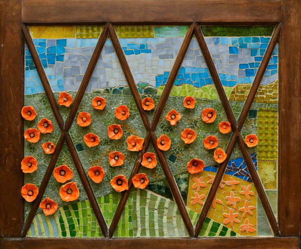 Field of Dreams, mixed-media mosaic on repurposed window by Cerulean Arts Collective member Barbara Bix.