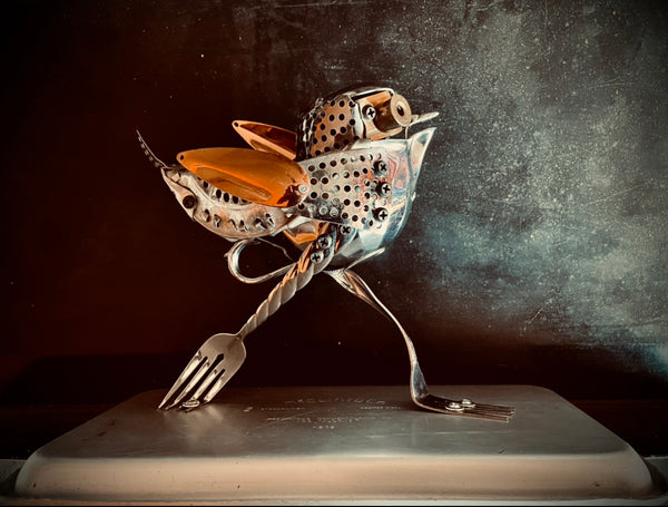 Running Bird, stainless, aluminum, copper and brass sculpture by artist Ritch Branstrom, available at Cerulean Arts. 