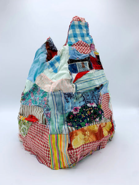 Multicolored patchwork fabric and foam sculpture