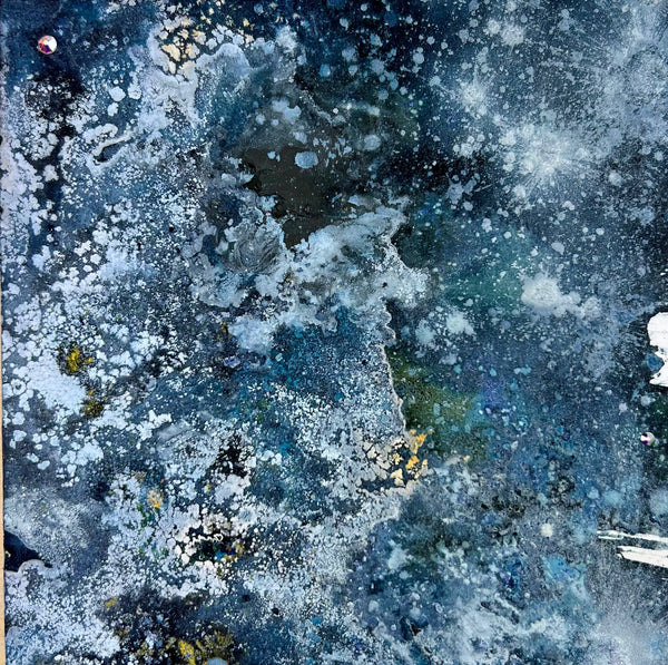 Abstract art piece with blue, navy and white colors and a seafoam like texture