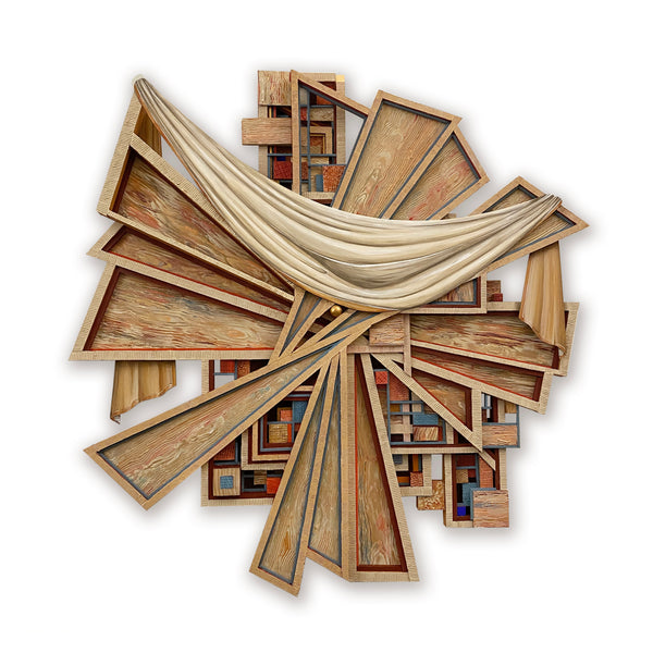 Wooden abstract sculpture with fabric draped over it on a white background